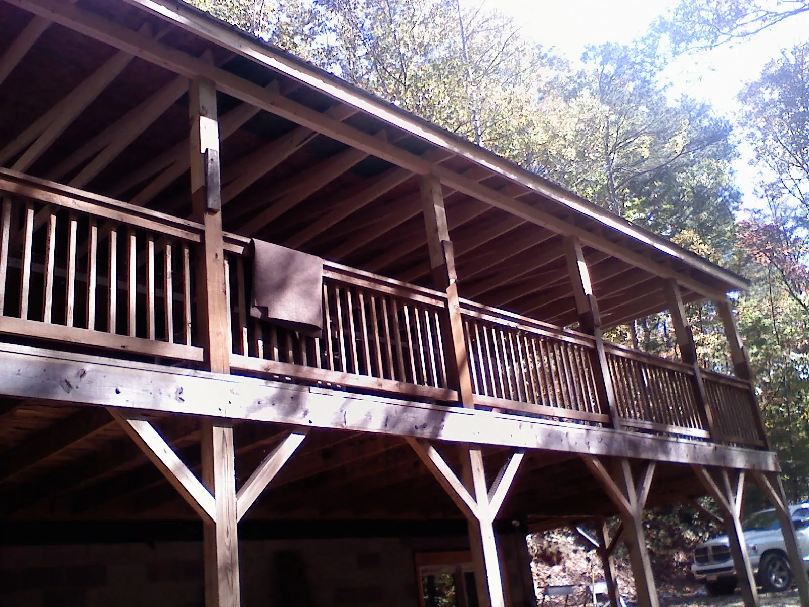 Timber framing under a new elevated porch and deck — Roof Leak Repair in North Branford by Roofing Brothers